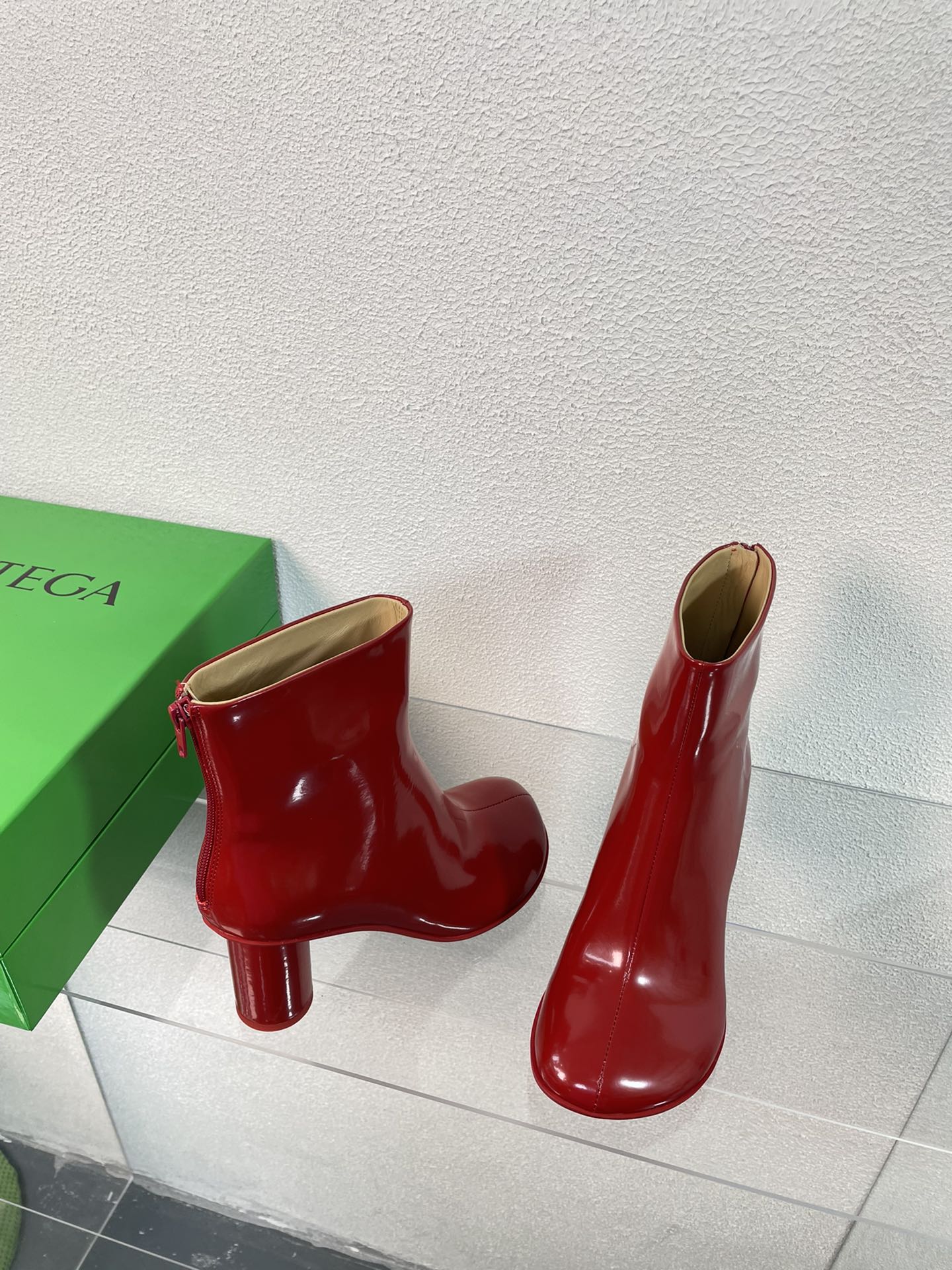 BOTTEGA VENETA ATOMIC ANKLE BOOT IN RUBY RED CALFSKIN 75 MM
