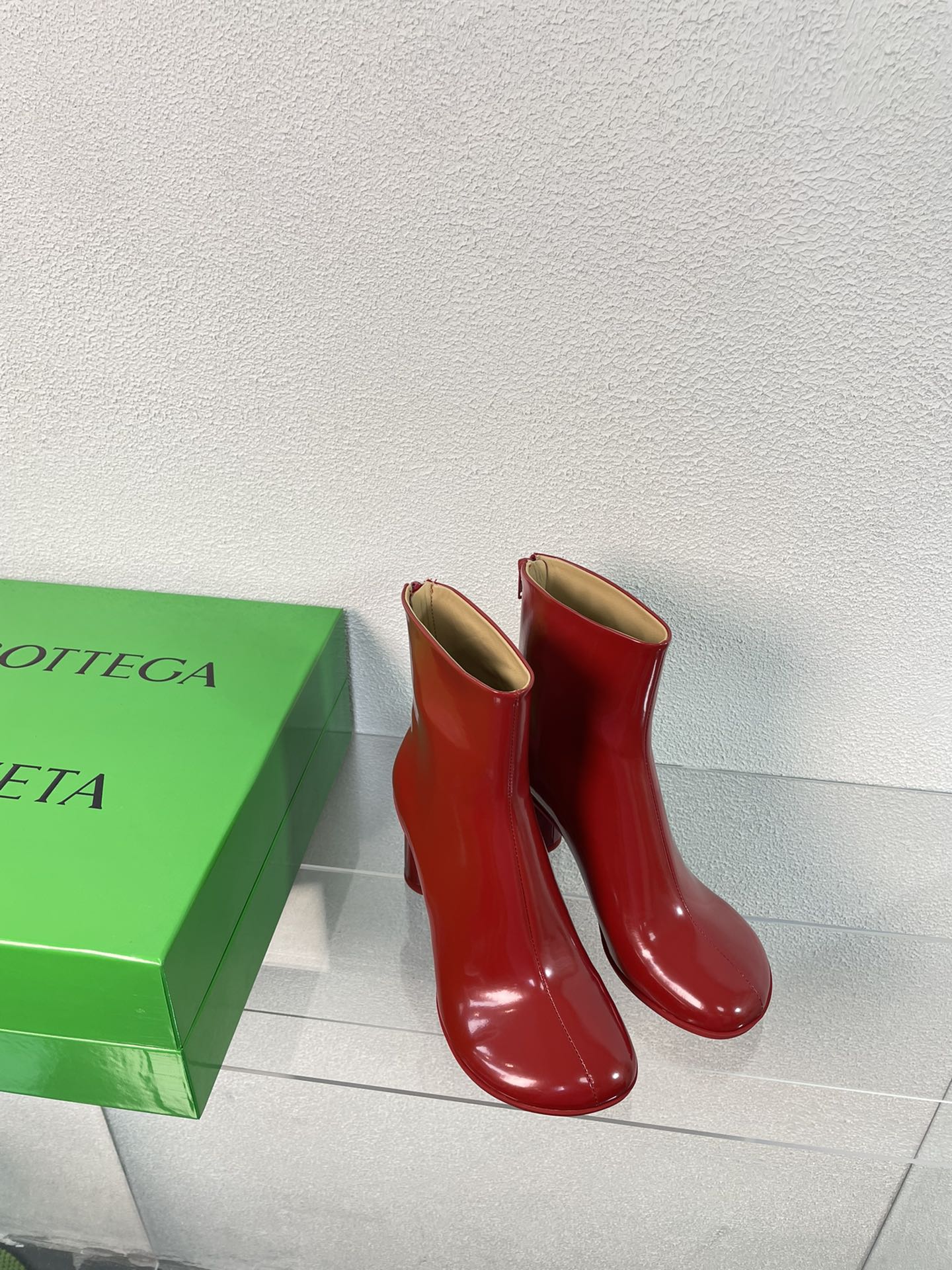 BOTTEGA VENETA ATOMIC ANKLE BOOT IN RUBY RED CALFSKIN 75 MM