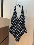 CHANEL BIKINI SWIMSUIT SET IN WHITE CHECKERED PRINT ON BLACK BACKGROUND 624545