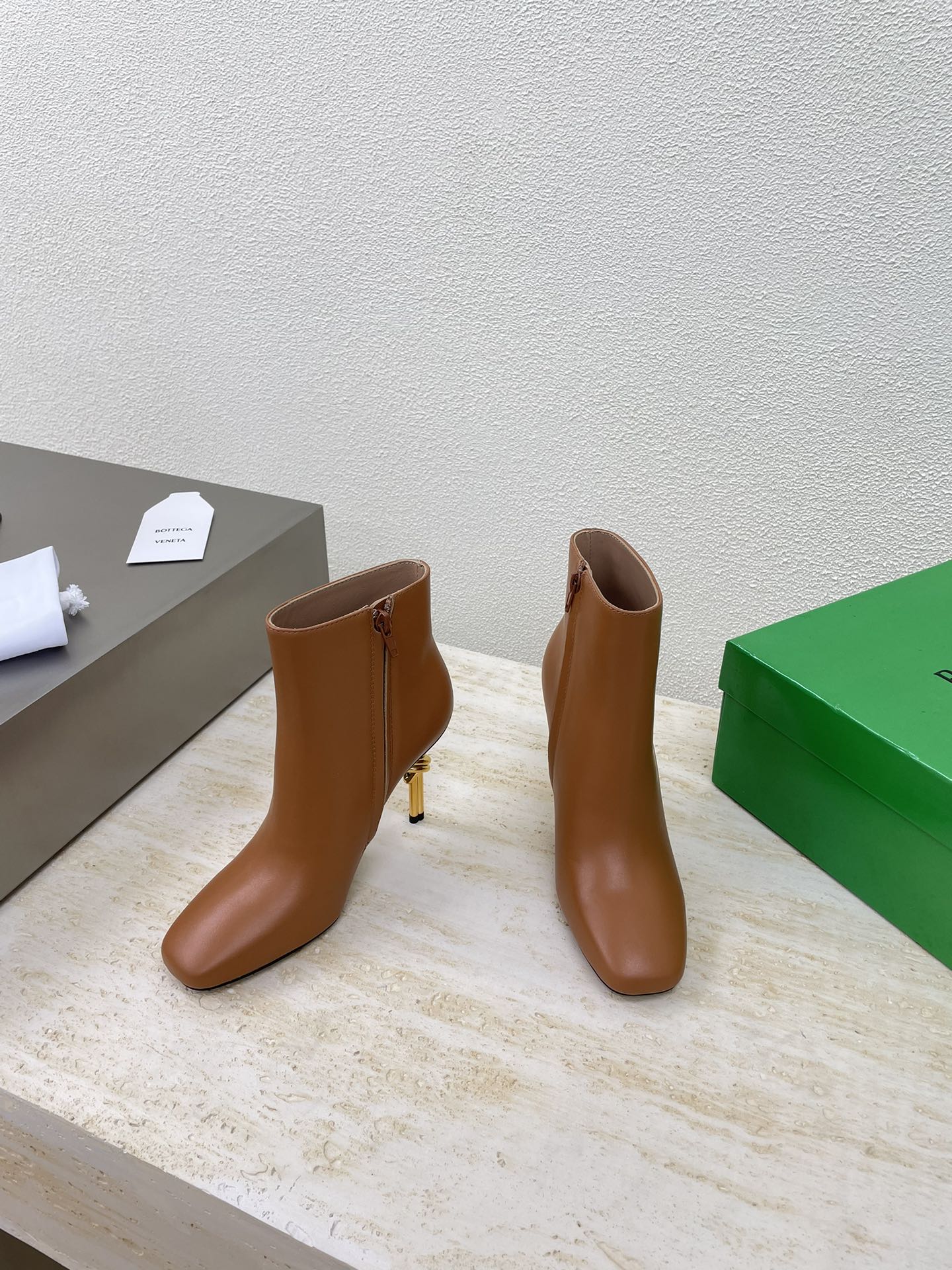 BOTTEGA VENETA KNOT ANKLE BOOT IN BRONZE BROWN CALFSKIN WITH GOLD METAL HEEL 9 CM