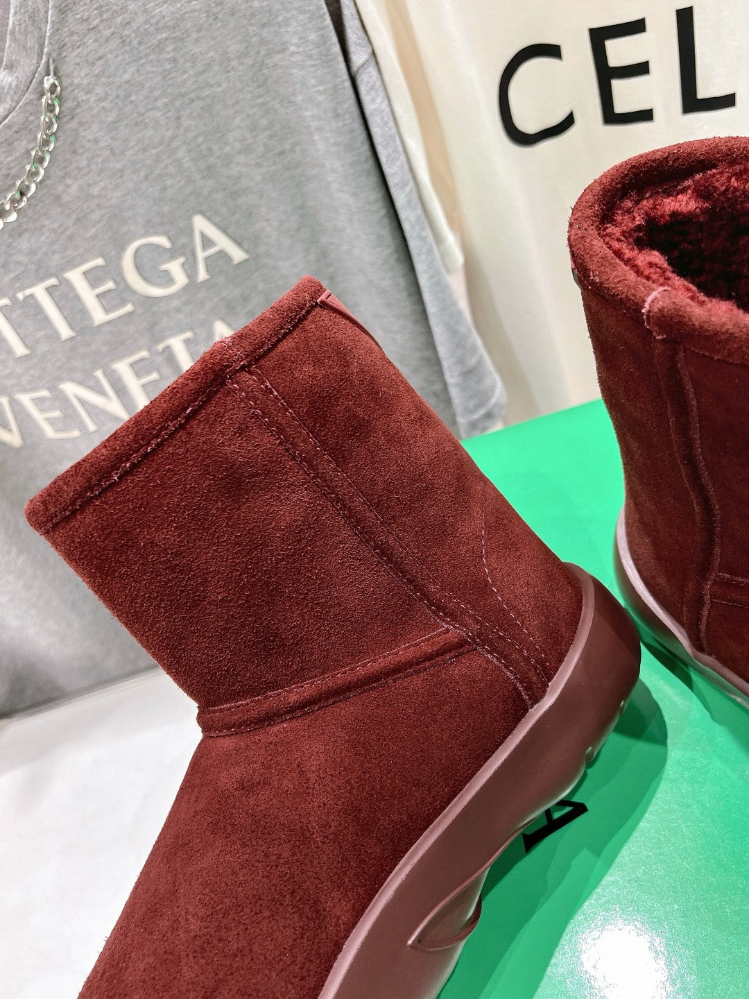 BOTTEGA VENETA SNAP MINI ANKLE BOOTS IN JAM RED SUEDE AND SHEARLING LINING